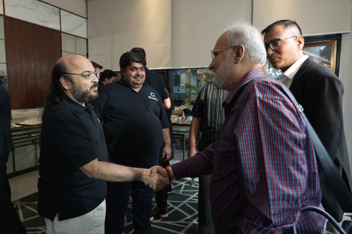 DocQ team networking with attendees at the venue